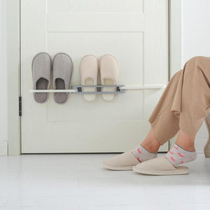 حامل و منضم الاحدية والمناشف الجديد